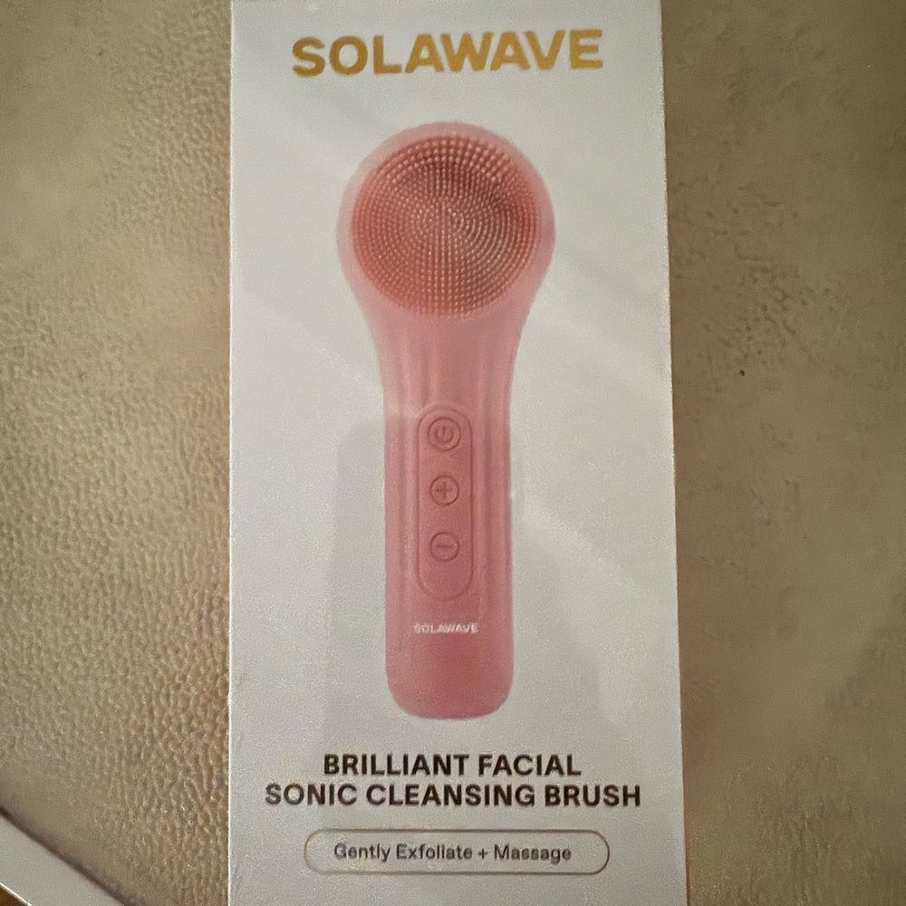 NWT solawave sonic care cleansing brush. Still in plastic wrap.